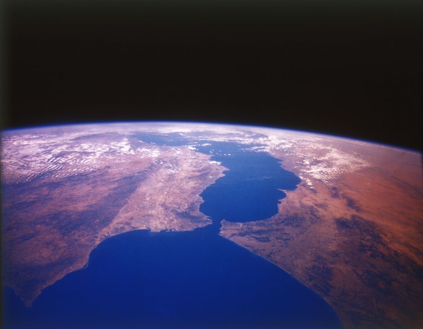 View from space, c1980s: The Straits of Gibraltar, where Europe's southern tip at Gibraltar nearly connects with Morocco's coast, delineating the Atlantic Ocean from the Mediterranean Sea.